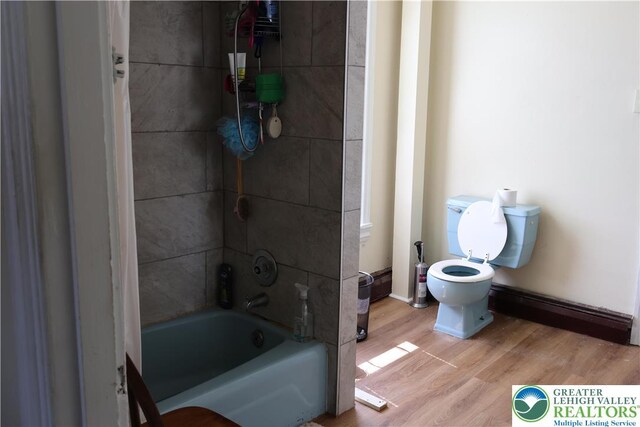 1533 E Emmaus, Salisbury Twp, PA 18103 - bathroom with wood finished floors and shower / washtub combination