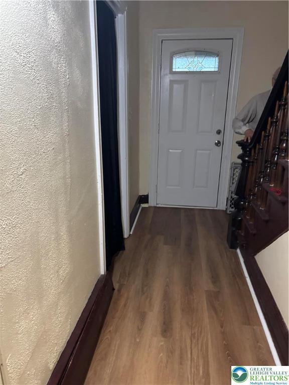 1533 E Emmaus, Salisbury Twp, PA 18103 - foyer entrance with wood finished floors and a textured wall