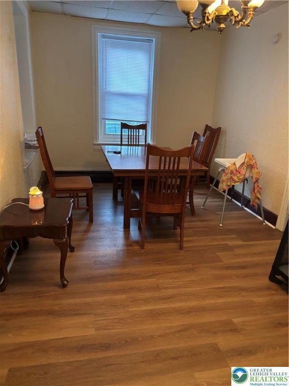 1533 E Emmaus, Salisbury Twp, PA 18103 - dining area featuring a chandelier, light wood-style floors, and a drop ceiling