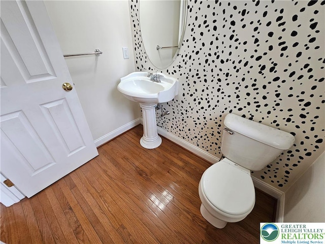 312 Maple Ct, Alburtis Boro, PA 18011 - half bathroom with baseboards and wood finished floors