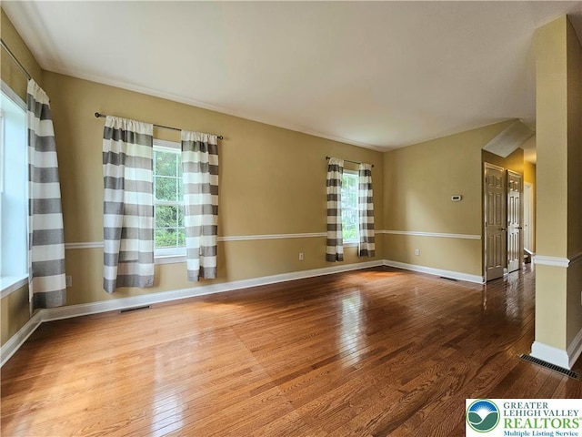 312 Maple Ct, Alburtis Boro, PA 18011 - empty room featuring plenty of natural light and hardwood / wood-style flooring