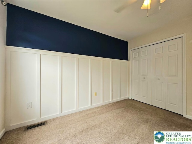 312 Maple Ct, Alburtis Boro, PA 18011 - unfurnished bedroom featuring carpet floors, a closet, and ceiling fan