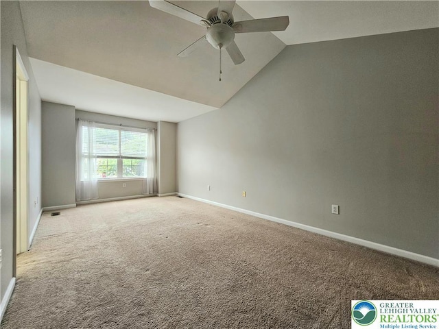312 Maple Ct, Alburtis Boro, PA 18011 - empty room featuring a ceiling fan, light carpet, and lofted ceiling