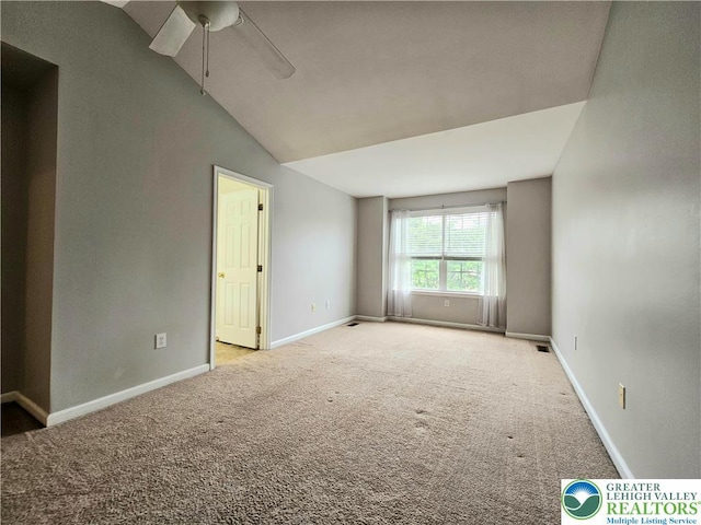 312 Maple Ct, Alburtis Boro, PA 18011 - carpeted empty room featuring vaulted ceiling and a ceiling fan
