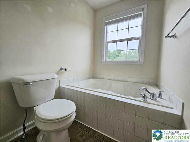 312 Maple Ct, Alburtis Boro, PA 18011 - bathroom with a garden tub and tile patterned floors