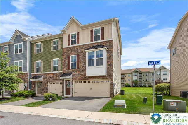 2324 Raya Way, Easton, PA 18045 - view of front of house with stone siding, driveway, a front yard, an attached garage, and a residential view