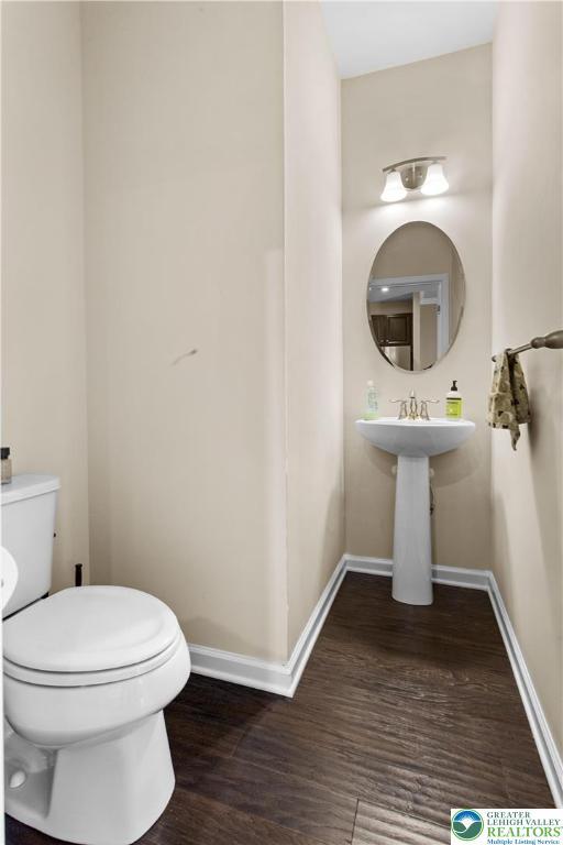 2324 Raya Way, Easton, PA 18045 - half bath featuring wood finished floors and baseboards