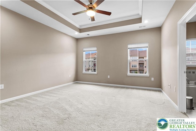 2324 Raya Way, Easton, PA 18045 - carpeted empty room with ceiling fan, a tray ceiling, healthy amount of natural light, ornamental molding, and recessed lighting