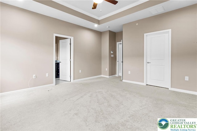 2324 Raya Way, Easton, PA 18045 - unfurnished bedroom featuring light carpet, crown molding, a raised ceiling, ensuite bath, and recessed lighting