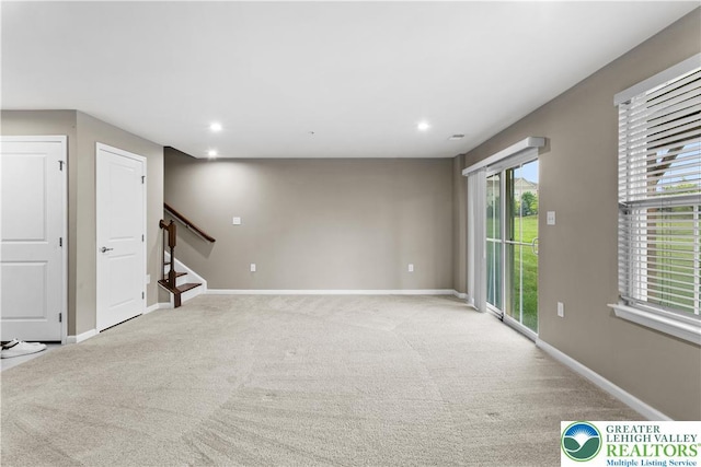 2324 Raya Way, Easton, PA 18045 - spare room featuring stairway, light colored carpet, and recessed lighting
