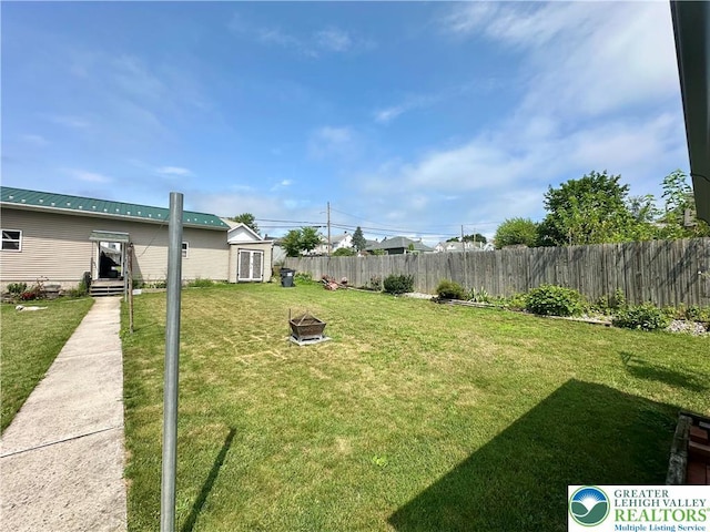 218 3rd, Lehighton Boro, PA 18235 - view of yard featuring a fire pit, an outbuilding, and entry steps