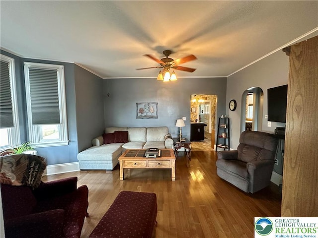 218 3rd, Lehighton Boro, PA 18235 - living room with arched walkways, wood finished floors, ceiling fan, and crown molding