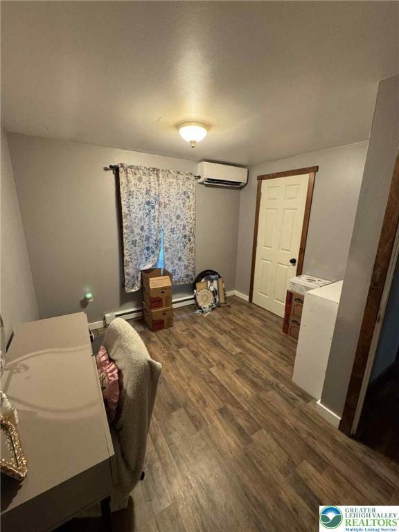 15 Hiawatha Trl, Penn Forest Twp, PA 18210 - bedroom with dark wood-type flooring and a baseboard heating unit