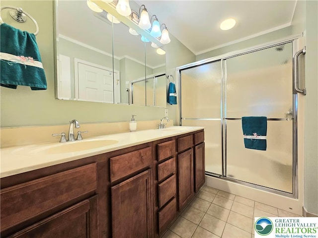 15 Devonshire Dr, Palmer Twp, PA 18045 - full bath with ornamental molding, tile patterned flooring, double vanity, and a shower stall