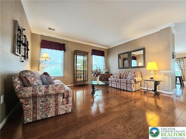15 Devonshire Dr, Palmer Twp, PA 18045 - living room with healthy amount of natural light, wood finished floors, and ornamental molding