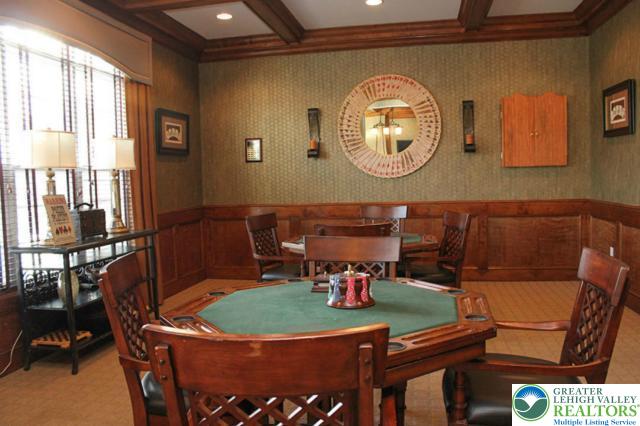 15 Devonshire Dr, Palmer Twp, PA 18045 - dining room with a wainscoted wall, beamed ceiling, coffered ceiling, and crown molding