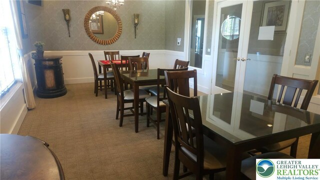 15 Devonshire Dr, Palmer Twp, PA 18045 - dining room featuring a wainscoted wall, wallpapered walls, and a decorative wall