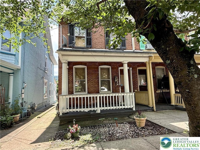 926 Delaware Ave, Fountain Hill Boro, PA 18015 - view of front of house with a porch and brick siding