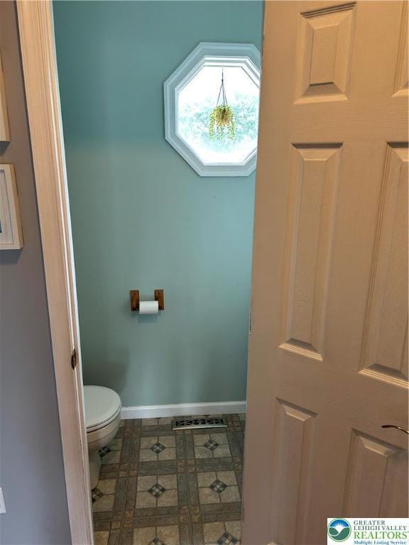 359 2nd, Alburtis Boro, PA 18011 - bathroom with baseboards and tile patterned flooring