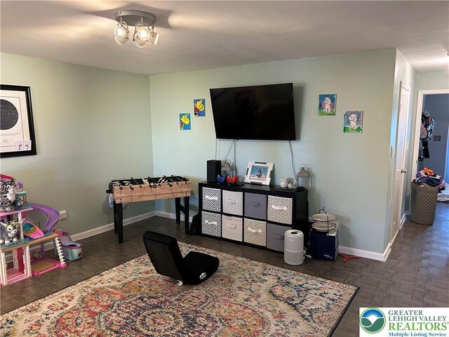 359 2nd, Alburtis Boro, PA 18011 - recreation room with baseboards and a chandelier
