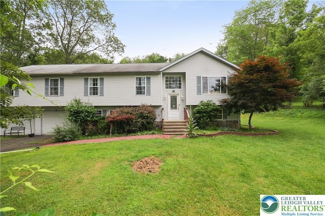 303 Lakefield Ter, Jackson Twp, PA 18360 - split foyer home with a front yard and a garage