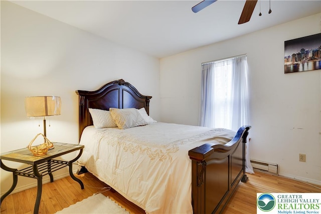 303 Lakefield Ter, Jackson Twp, PA 18360 - bedroom with light wood finished floors, a baseboard radiator, and ceiling fan