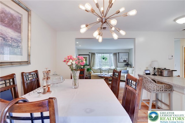303 Lakefield Ter, Jackson Twp, PA 18360 - dining room with a chandelier and wood finished floors