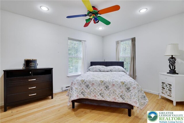 303 Lakefield Ter, Jackson Twp, PA 18360 - bedroom with light wood-style flooring, a baseboard radiator, recessed lighting, and ceiling fan