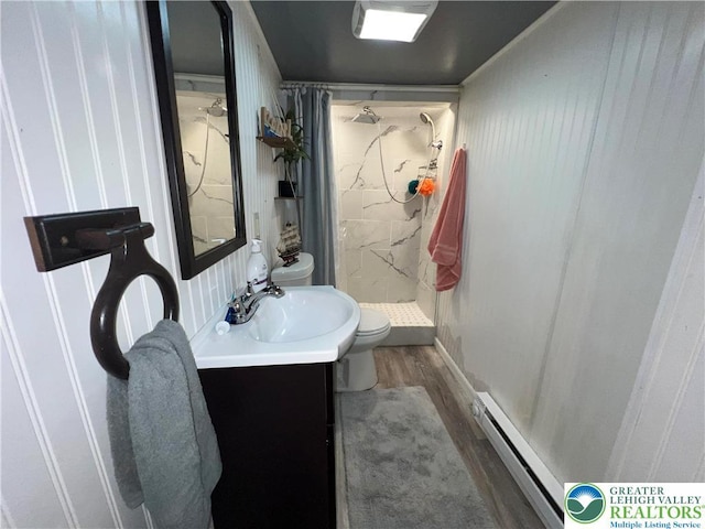 532 6th St, Whitehall Twp, PA 18052 - full bath featuring wood finished floors, baseboard heating, a shower stall, and vanity