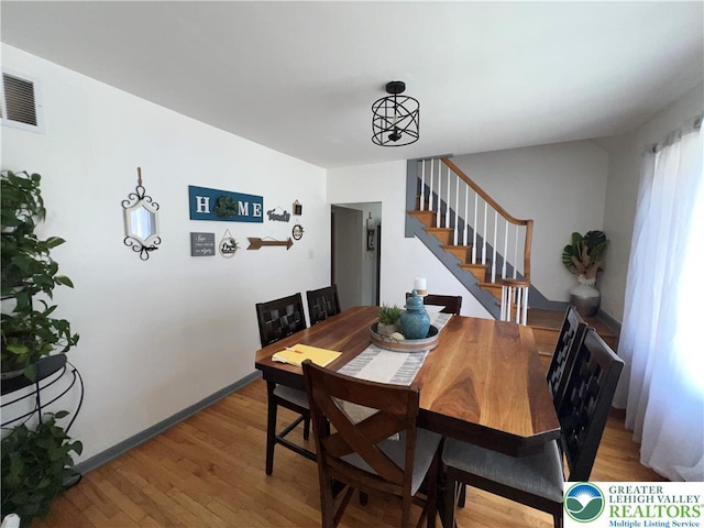532 6th St, Whitehall Twp, PA 18052 - dining space with light wood finished floors and stairs