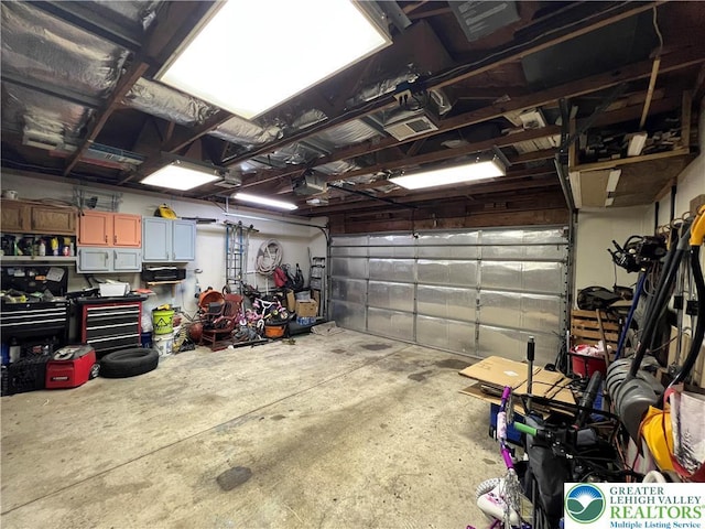 532 6th St, Whitehall Twp, PA 18052 - garage featuring a garage door opener