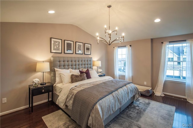 bedroom featuring vaulted ceiling and dark hardwood / wood-style floors