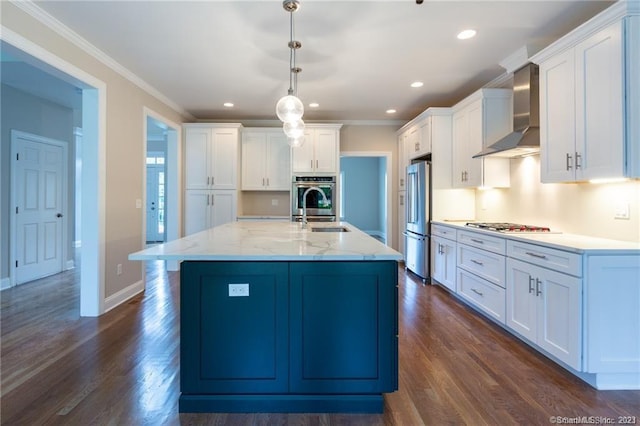 kitchen with dark hardwood / wood-style floors, hanging light fixtures, white cabinets, stainless steel appliances, and wall chimney exhaust hood