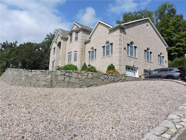 view of property exterior featuring a garage