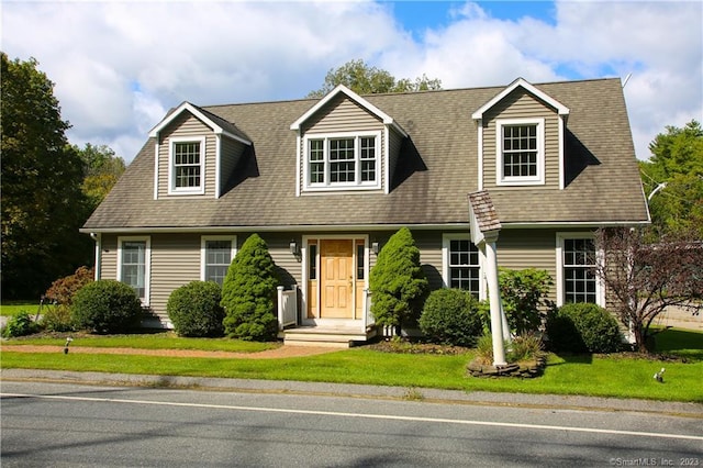 view of new england style home