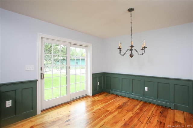 277 Ashley Falls Rd, North Canaan, CT 06018 - interior space with a chandelier, a baseboard radiator, and light wood-type flooring