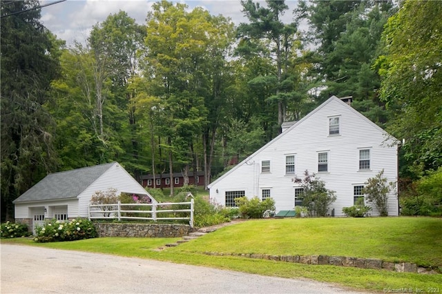 exterior space with a front lawn