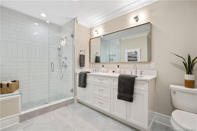 bathroom featuring ornamental molding, tile floors, toilet, and a shower with shower door