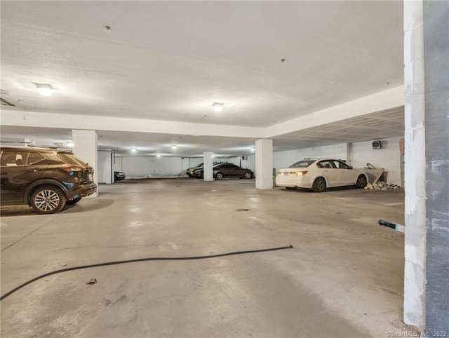 garage featuring a carport