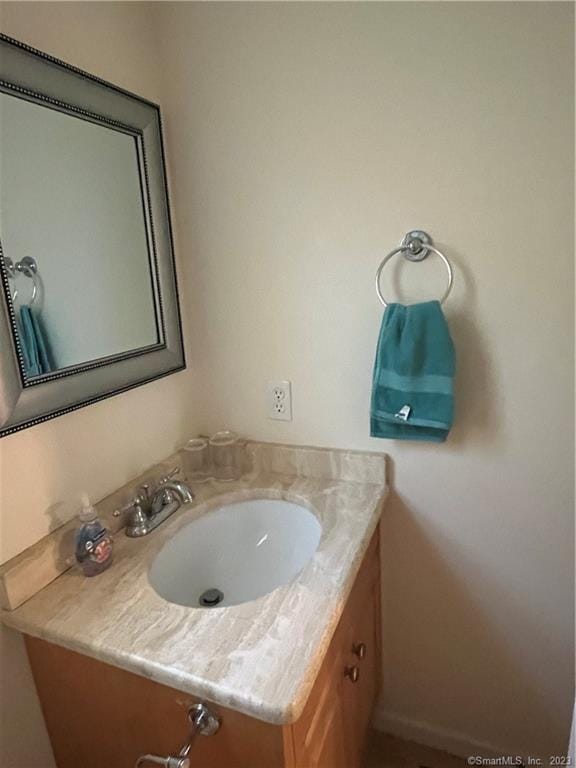 bathroom with vanity with extensive cabinet space