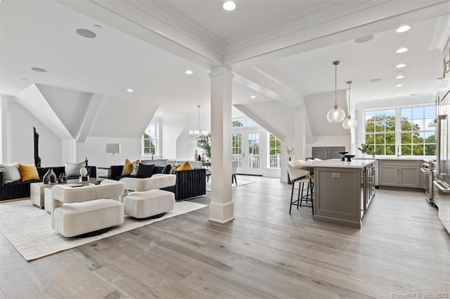 66 High St Unit 55, Guilford, CT 06437 - living area featuring healthy amount of natural light, light wood-type flooring, ornamental molding, and recessed lighting