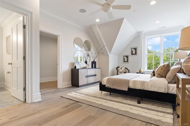 bedroom with light hardwood / wood-style floors, ceiling fan, and ornamental molding