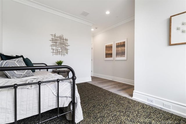 66 High St Unit 55, Guilford, CT 06437 - bedroom featuring ornamental molding, recessed lighting, and wood finished floors