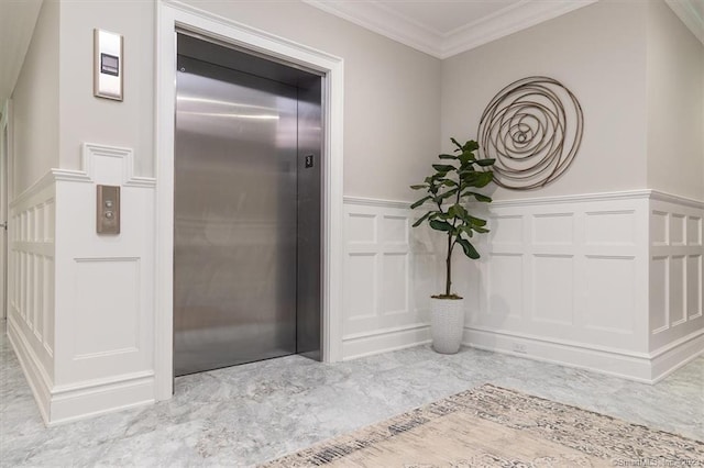 bathroom with ornamental molding and elevator