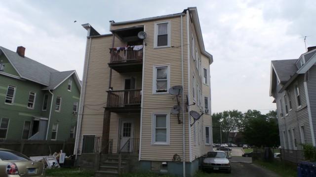 rear view of house with a balcony