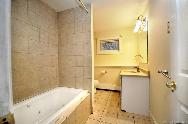 full bathroom with tiled shower / bath combo, vanity, tile patterned flooring, and toilet