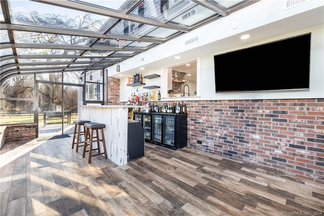 630 Cook Hill Rd, Cheshire, CT 06410 - indoor dry bar featuring wood finished floors and brick wall