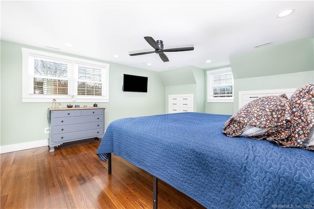 bedroom with ceiling fan and wood-type flooring