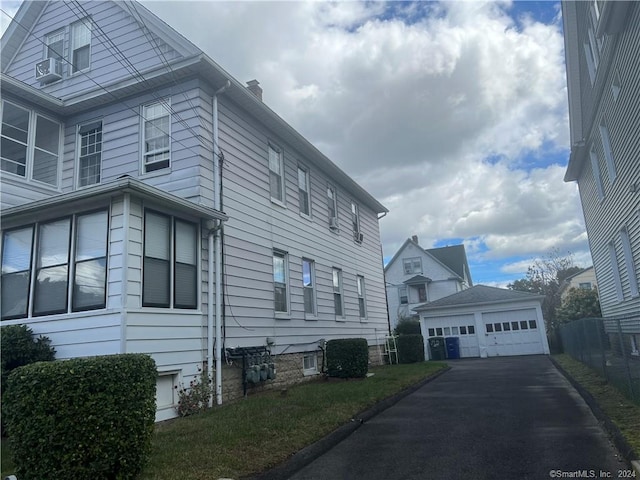 view of property exterior with a garage