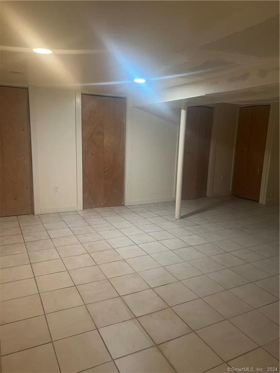 basement with light tile floors